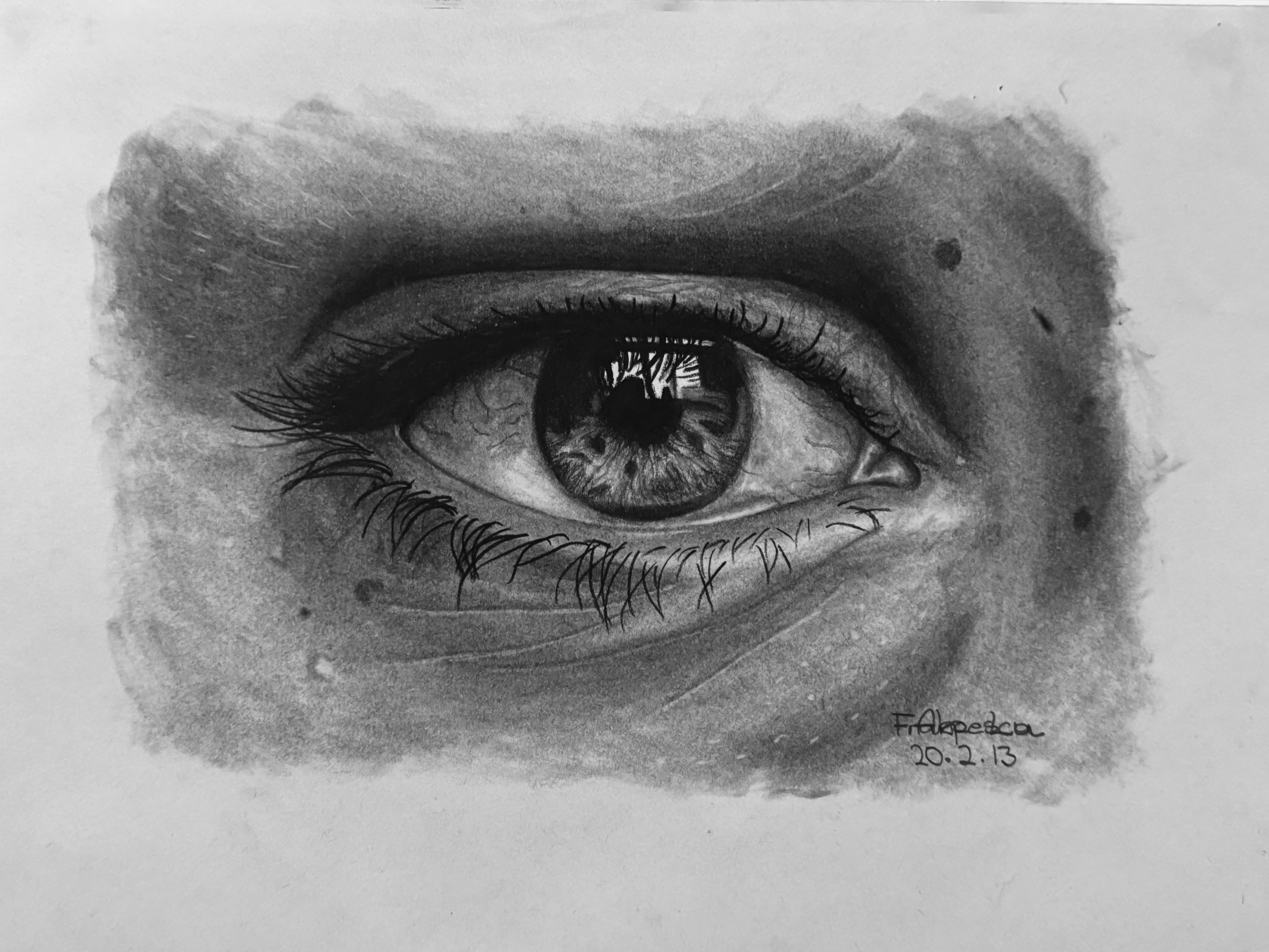 Eye drawn with charcoal